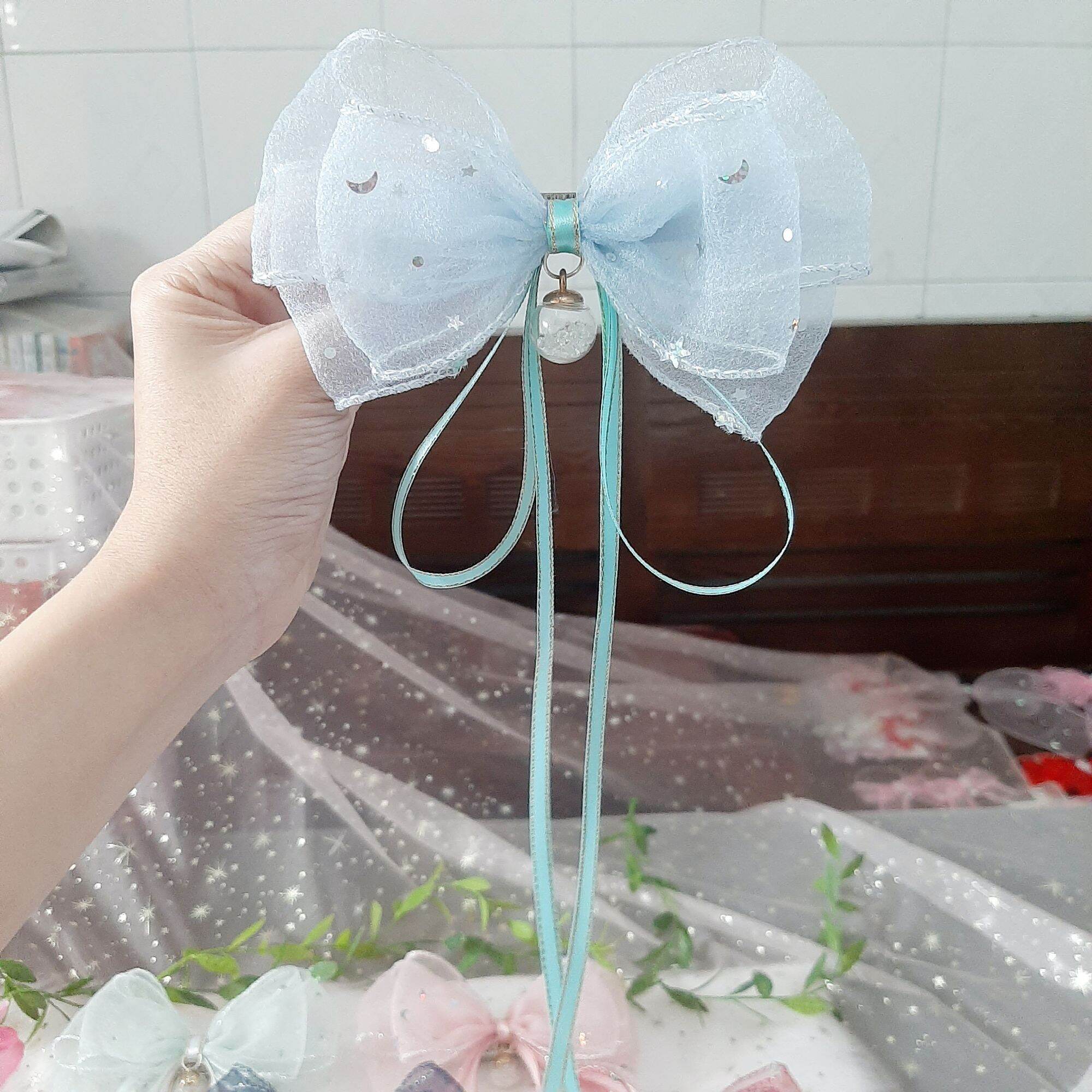 Kẹp tóc nơ trăng sao đính ngọc lấp lánh (mua 10 tặng 1)