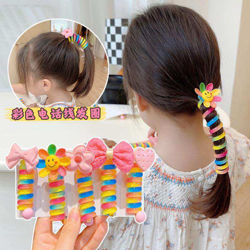 Dây buộc tóc cuộn dây lò xo màu cầu vồng