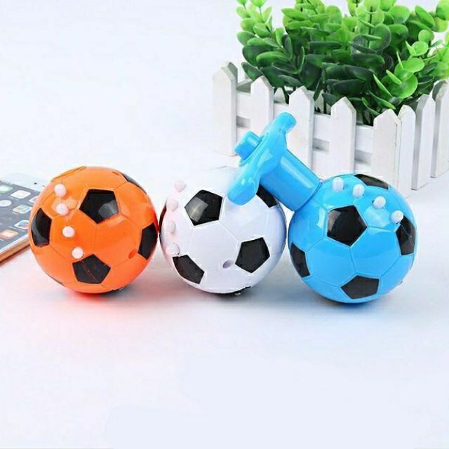 Đồ chơi con quay hình quả bóng . cù quay phát sáng và có nhạc