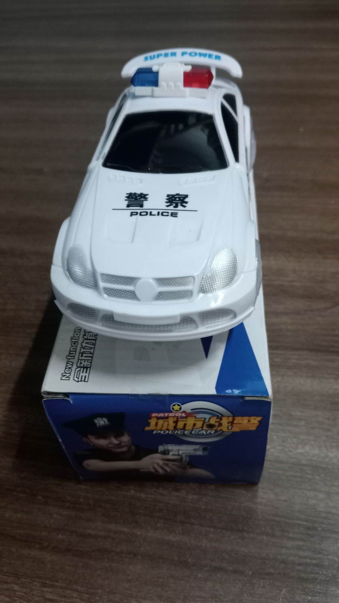 Đồ chơi xe cảnh sát nhạc đèn tự tiến lùi