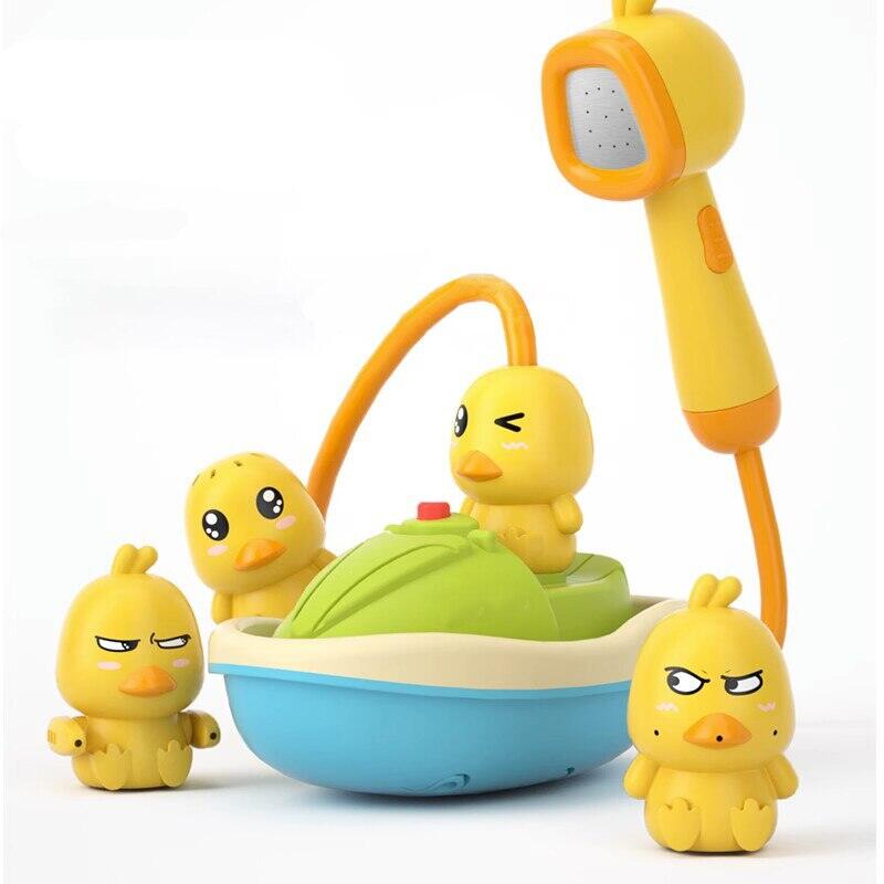 Em bé tắm đồ chơi trẻ em Điện chơi nước nhỏ màu vàng vịt tắm em bé sơ sinh phun nước đồ chơi bé trai và bé gái