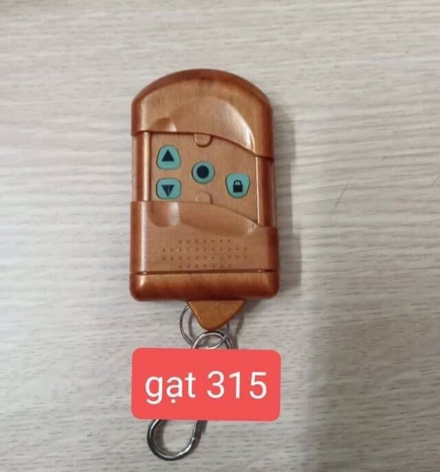 Remote điều khiển cửa cuốn mã gạt 315MHZ chống nước
