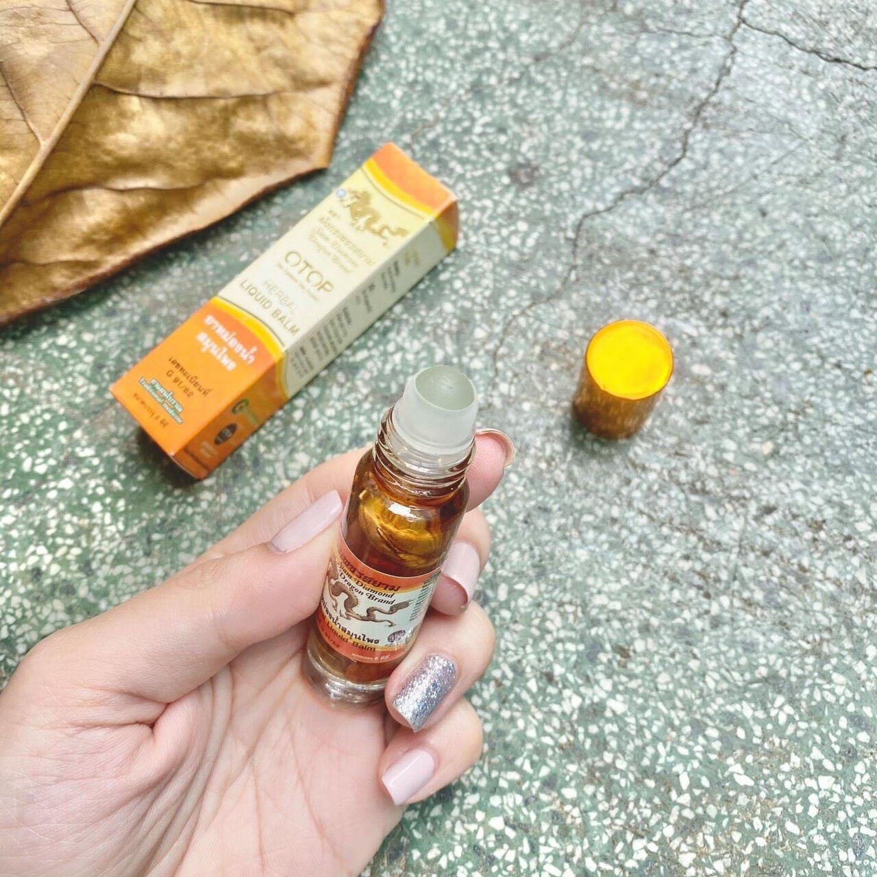 Dầu lăn Thảo Dược Otop 26 Vị con rồng vàng Thái Lan