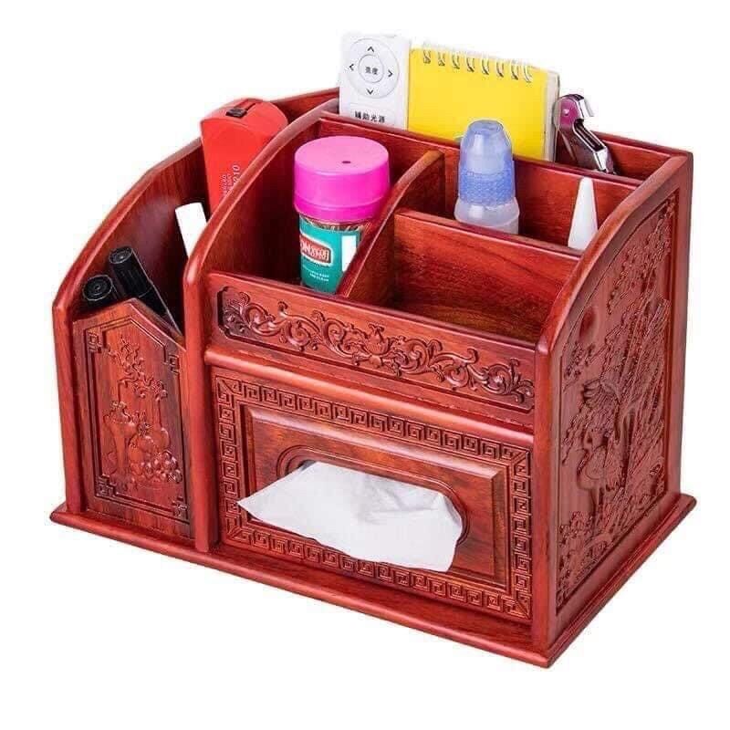 Kệ đựng đồ đa năng dùng để bút , giấy ăn , văn phòng phẩm làm từ gỗ hương ta . Dùng trang trí bàn làm việc , bàn tiếp khách .
