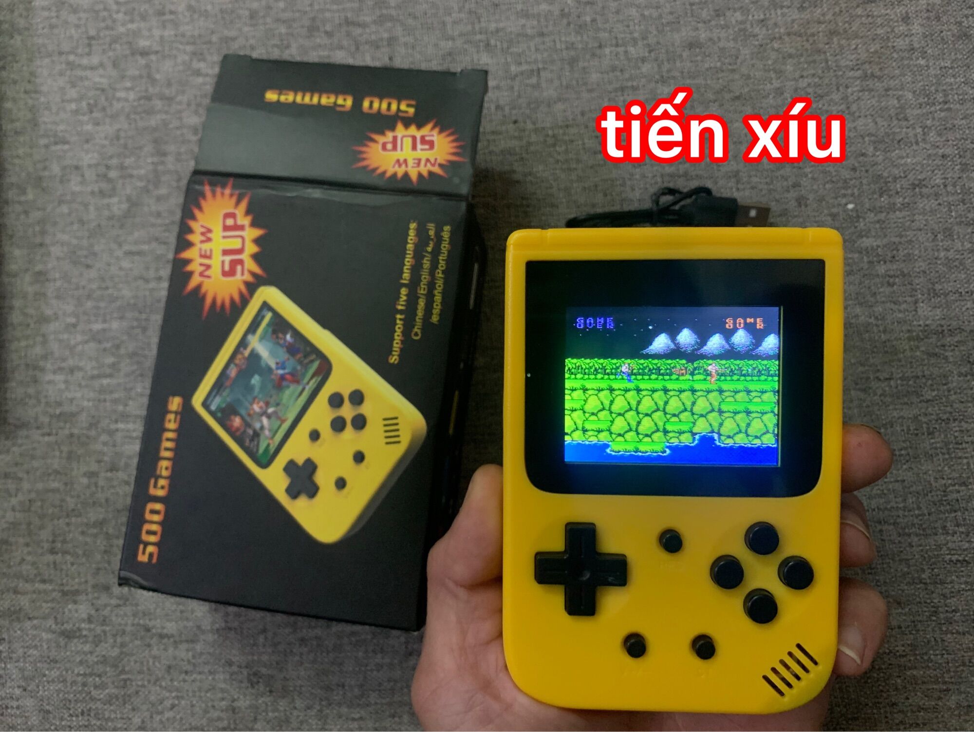 Máy trò chơi điện tử 4 nút cầm tay tích hợp 140 trò mario , contra , kage , ăn nấm