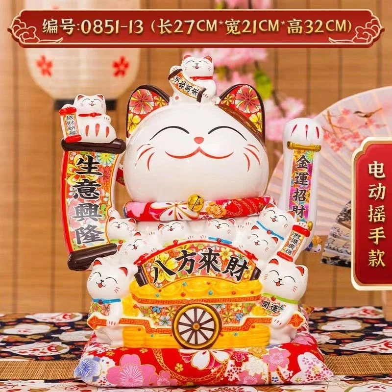 Mèo Thần Tài vẫy tay .