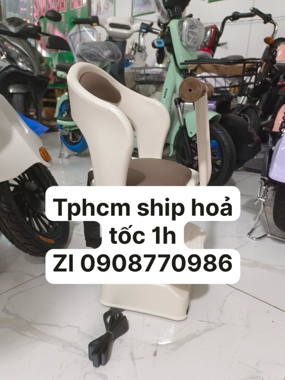 Yên em bé cho xe điện