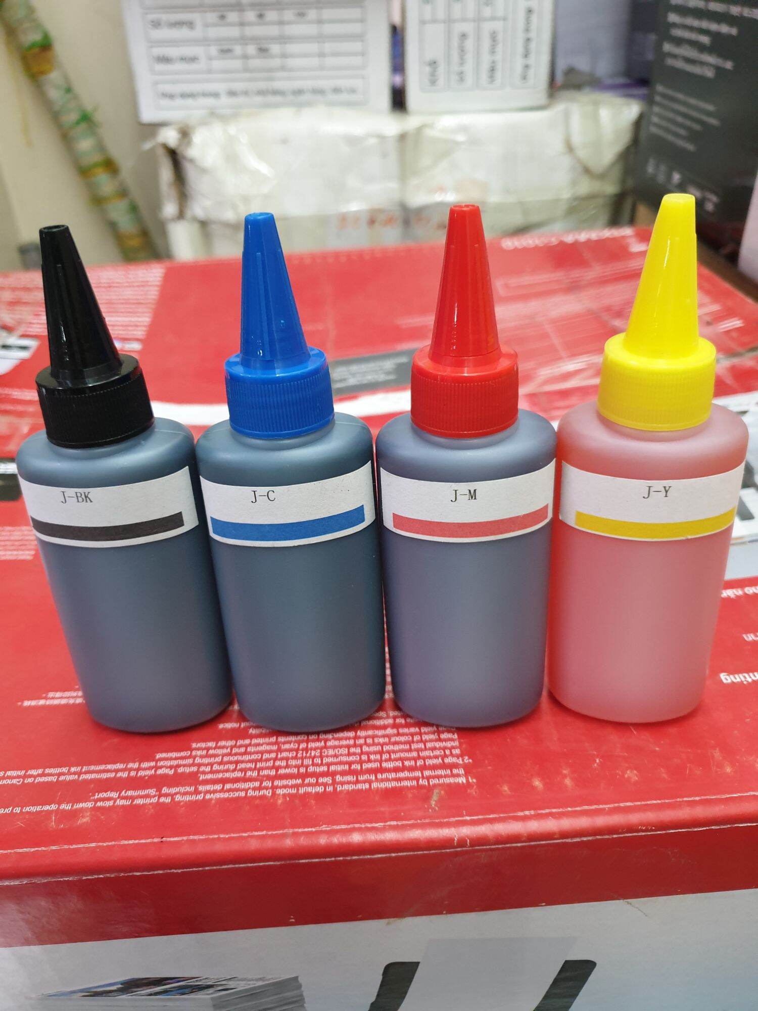 Bộ mực j 100ml 4 màu đen, xanh, đỏ ,vàng. dùng chung cho máy in canon