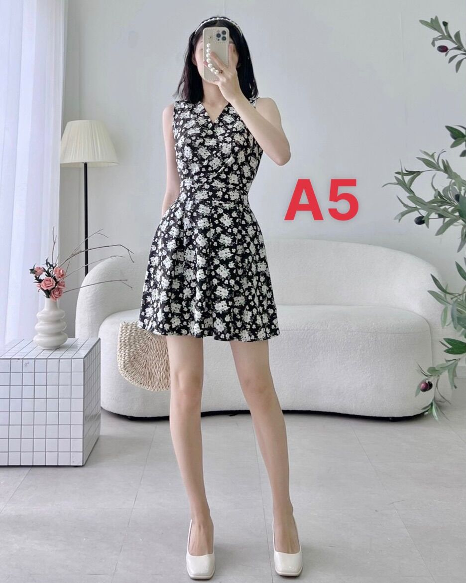 Đầm kèm thêm quần đùi, tim đắp chéo, hoa nhí. Chất lụa hàn.