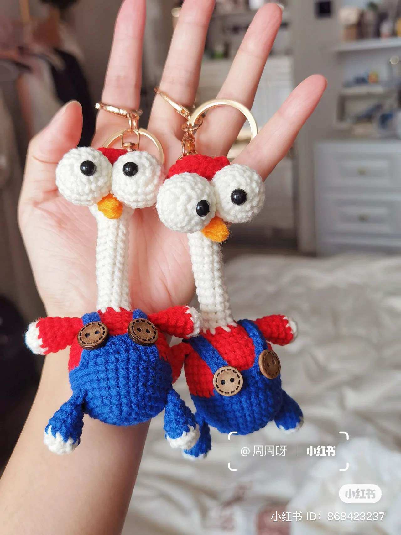 Móc khoá treo túi ngỗng mắt lồi