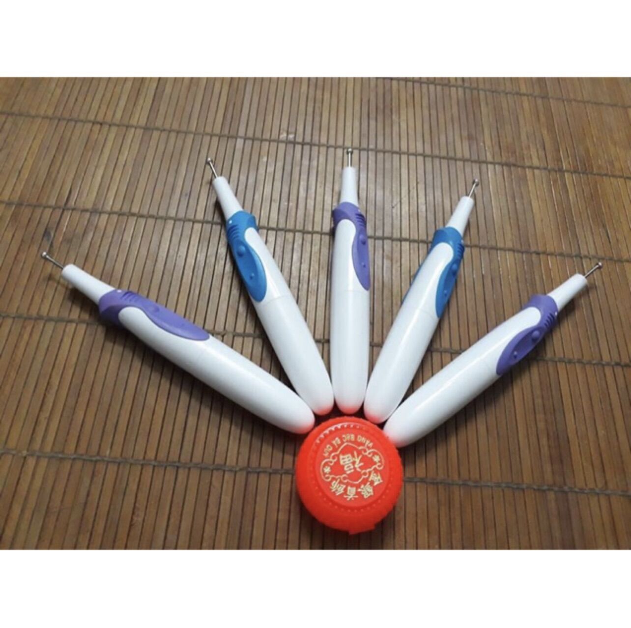 Bút rung huyệt đầu bạc