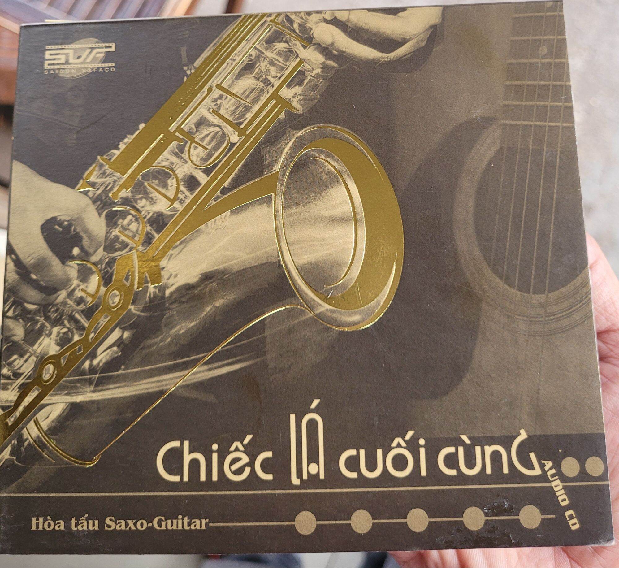 Cd chiếc lá cuối cùng. hòa tấu guitar - saxo. chính hãng, âm thanh và danh mục bài hát hay