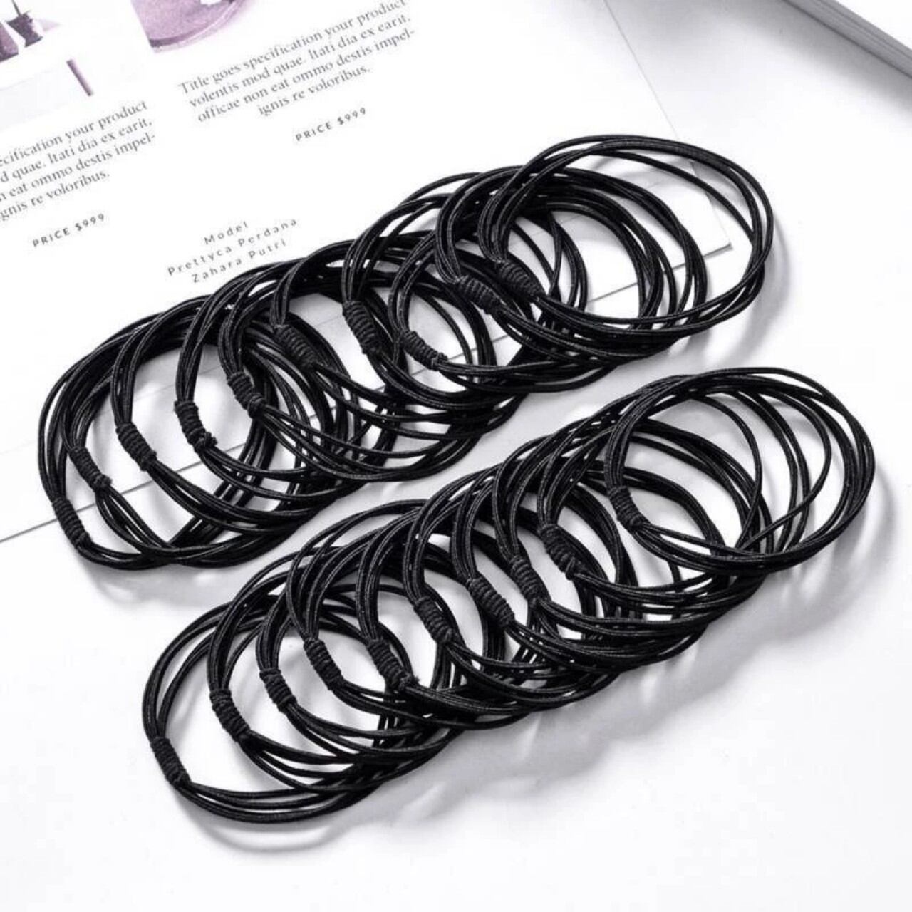Túi 10 thun cột tóc 4 sợi màu đen (5cm)