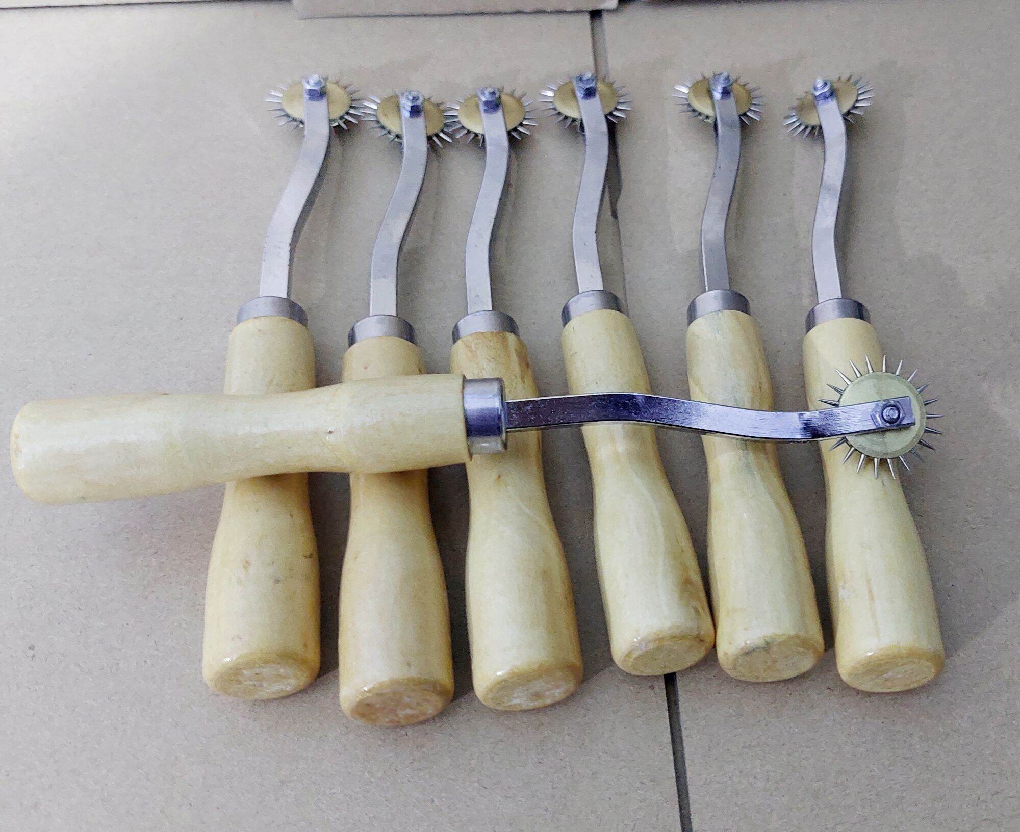 cây lăn sang dấu / lấy dấu trên rập may.
