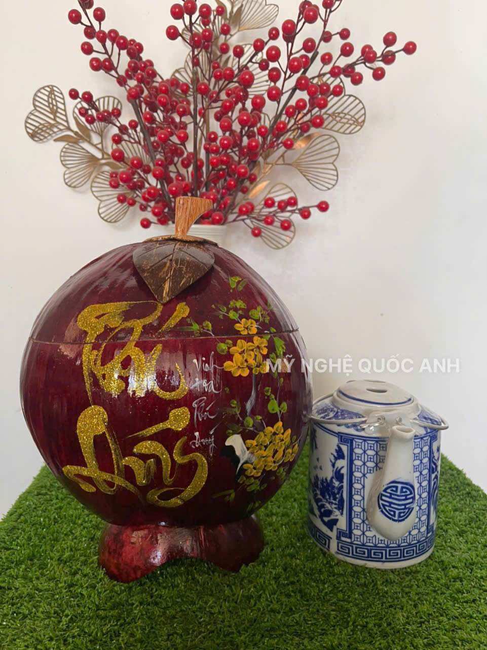 Vỏ dừa ủ ấm trà giử nhiệt vẽ thư pháp
