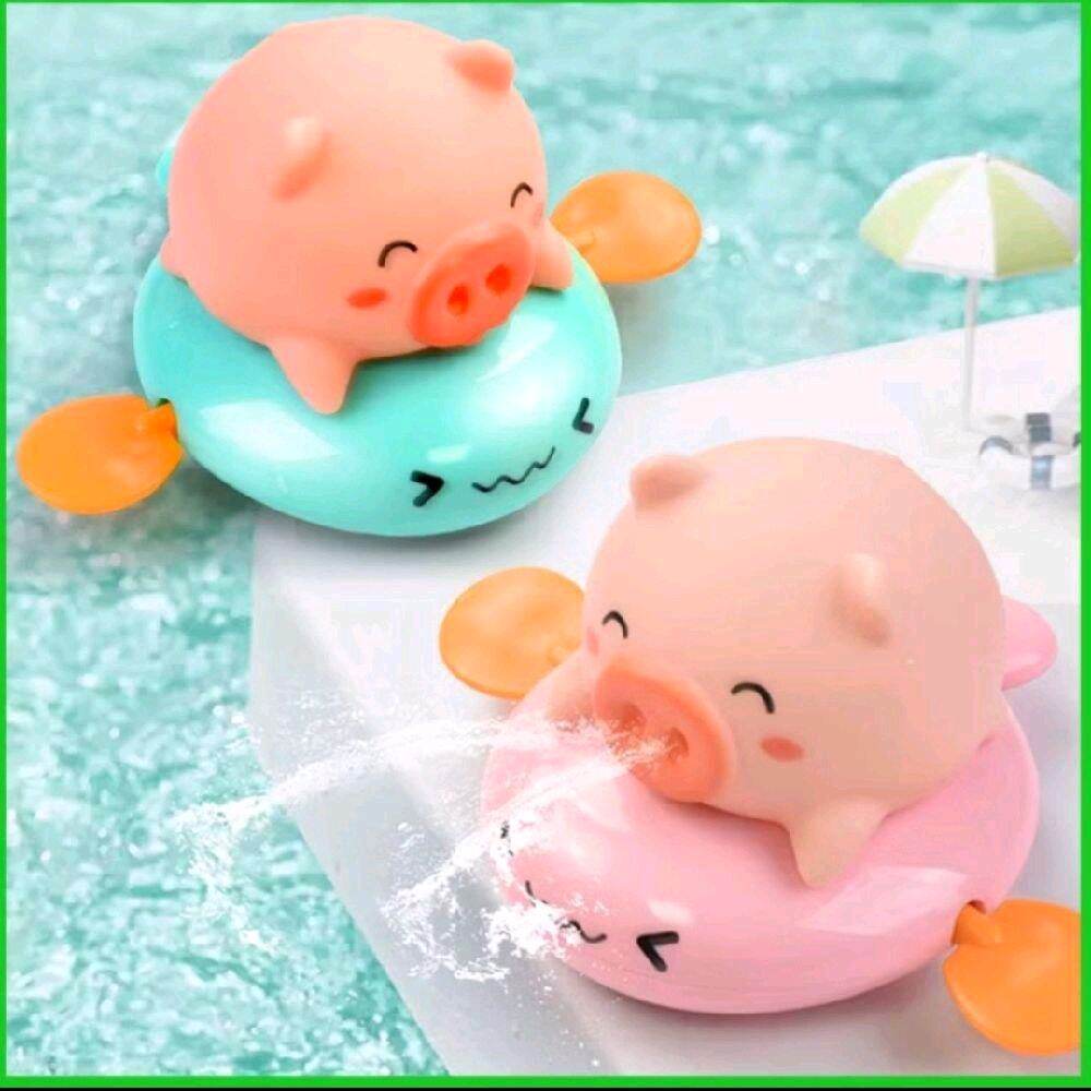 Heo bơi phun nước ở mũi,chạy bằng cót, thả bồn tắm cho bé