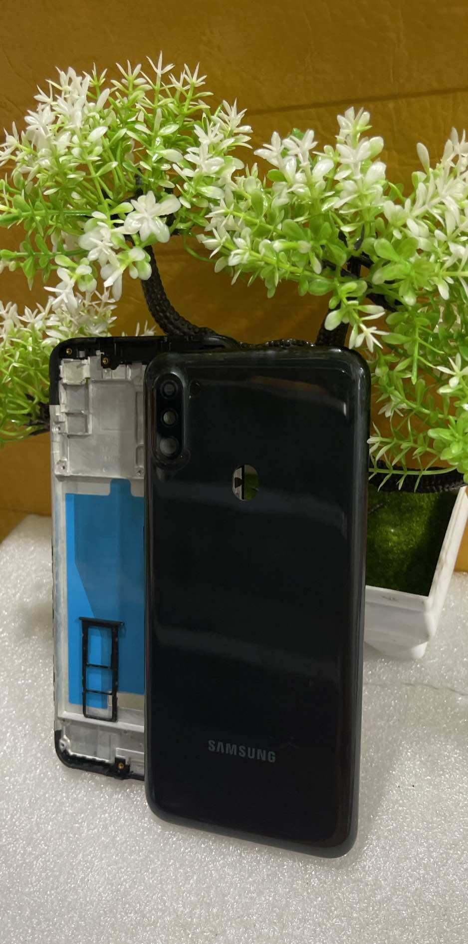 Vỏ Sam Sung A11 full bộ có luôn kính camera với khay sim