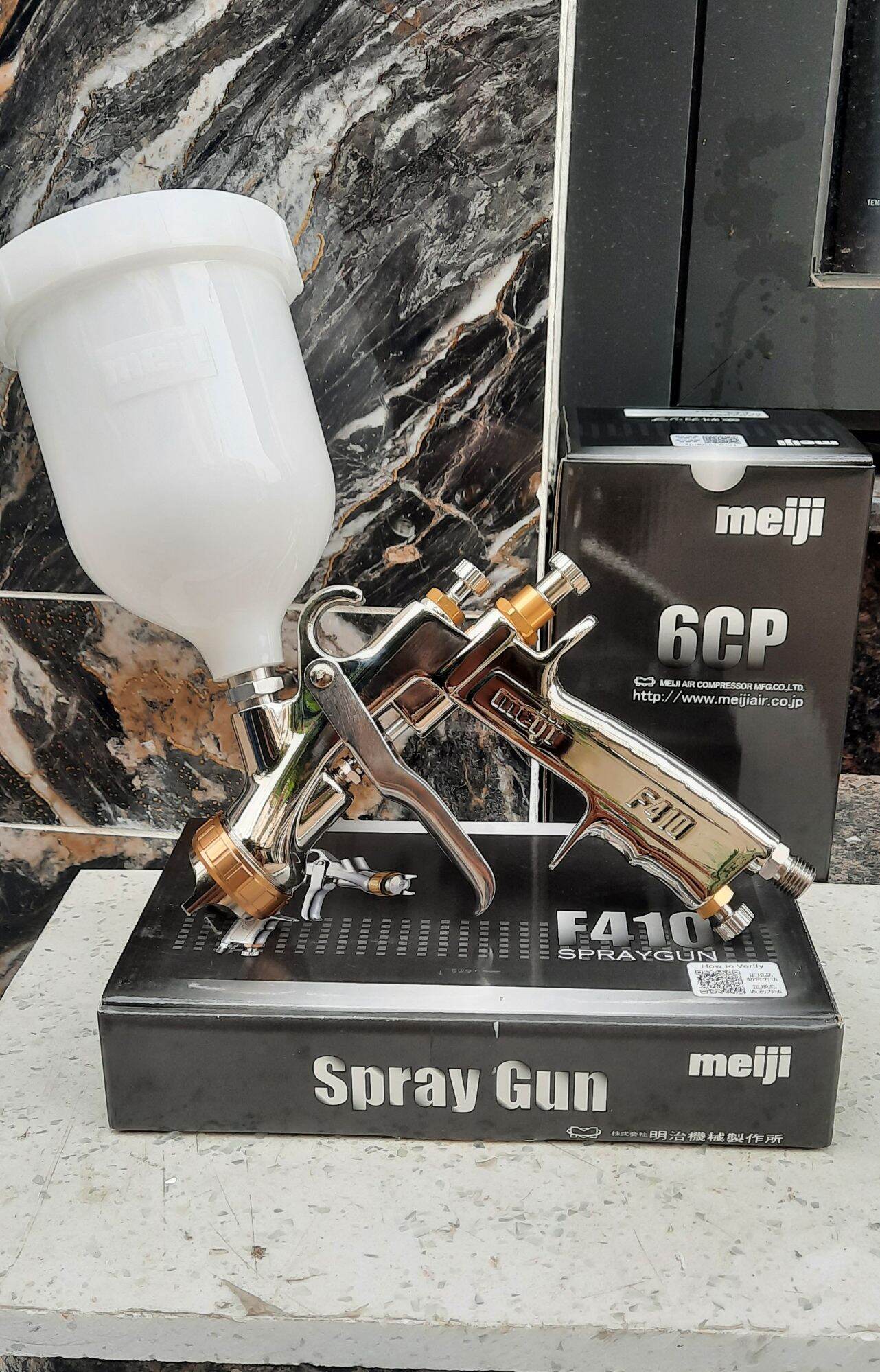 Súng phun sơn Meiji f410 Nhật Bản dòng súng cao cấp đầu béc 1.3mm và 1.4mm chuyên màu và bóng