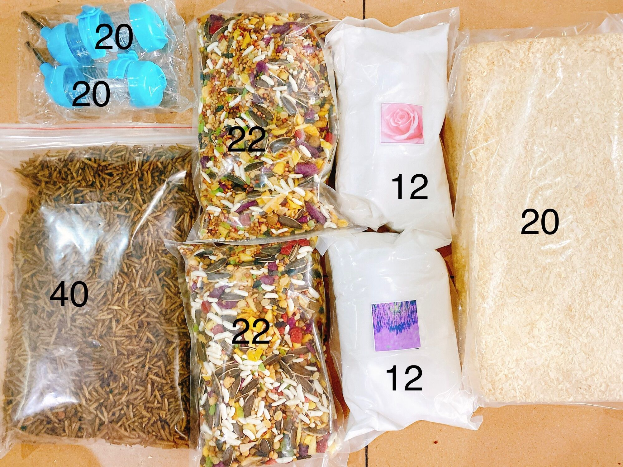 100g sâu rang 1 kg mùn nén 2 bịch thức ăn trộn hamster 2kg cát tắm 2 bình nước 90ml