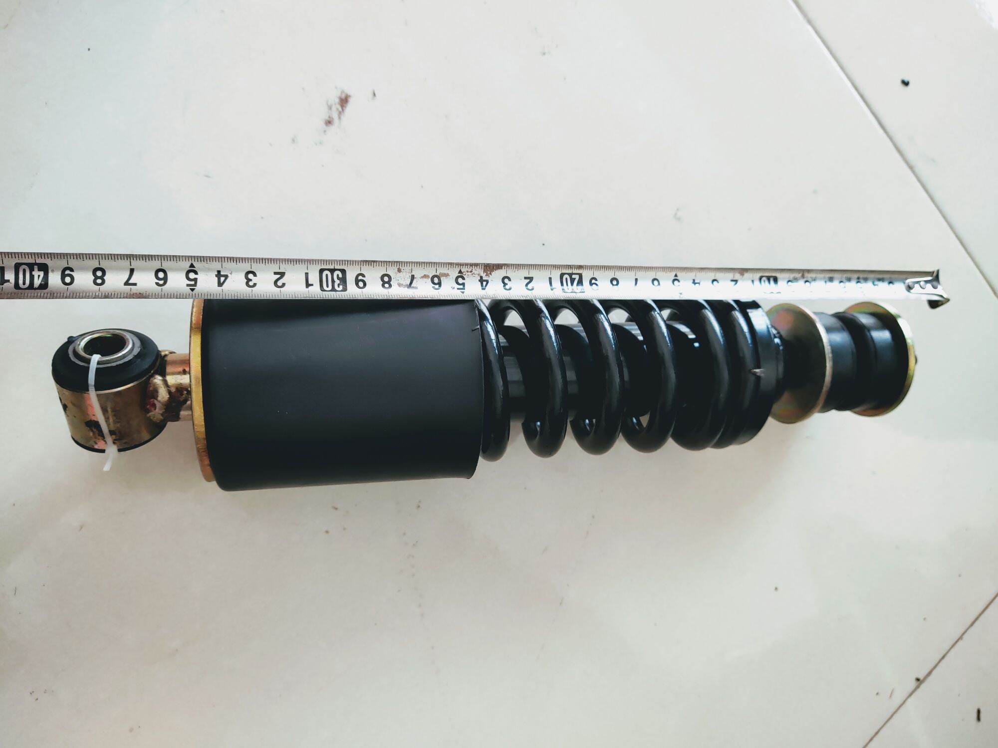 Giảm xóc lò xo trước Shacman