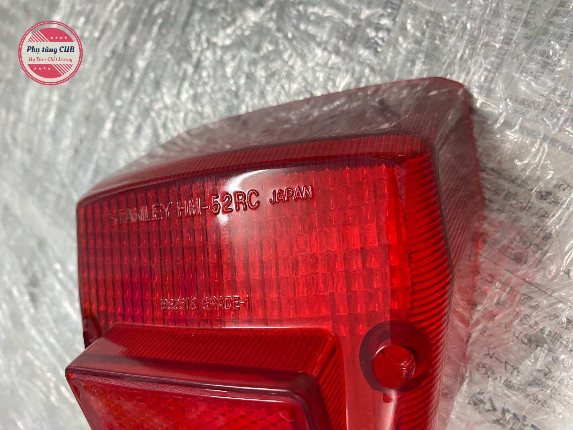 Chụp đèn hậu xe cub 82-84-DD hàng Thái ( có đóng Japan như zin )