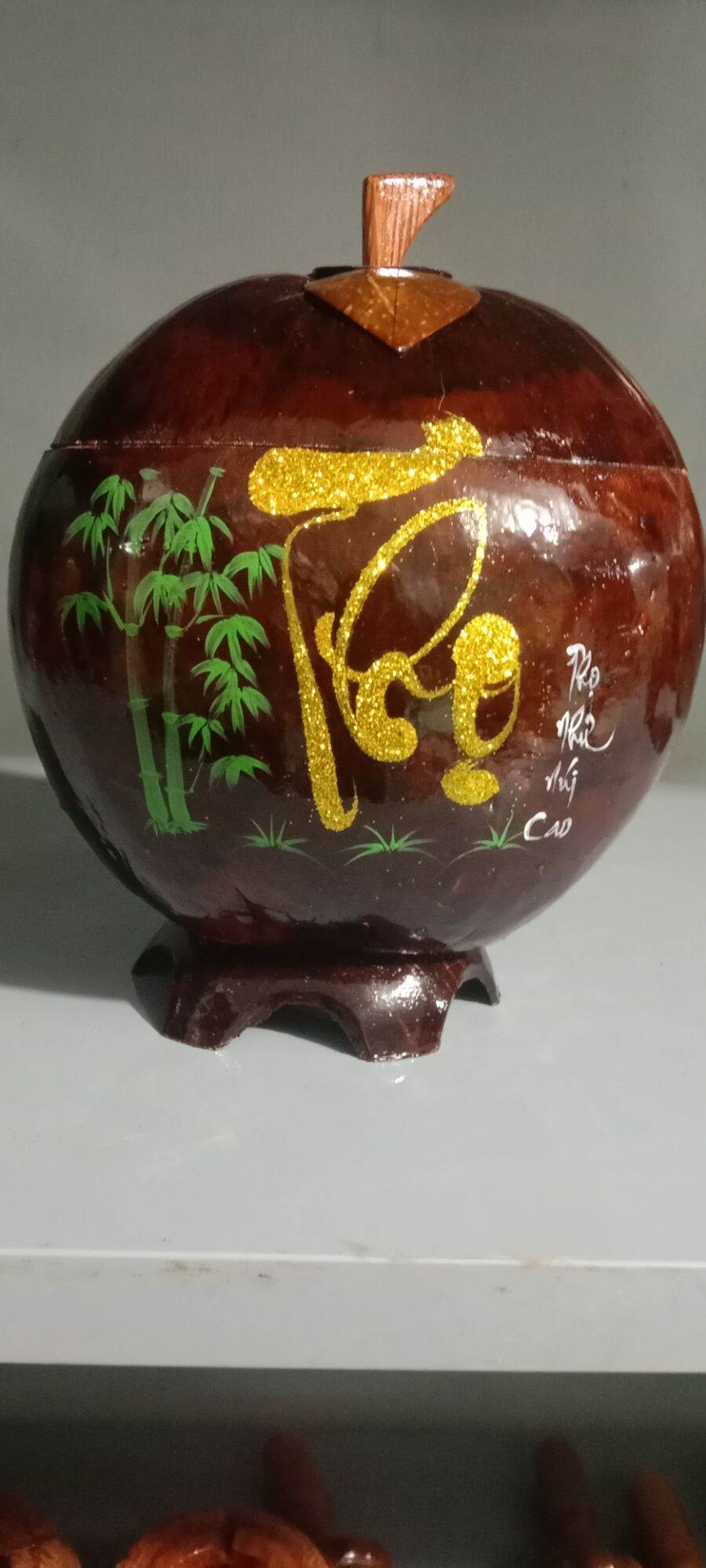 Quả dừa khô làm bình ủ trà kèm ấm tích
