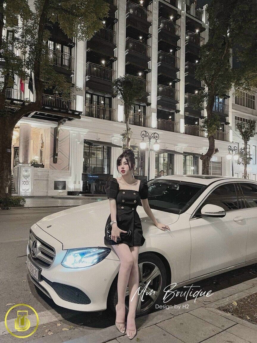 Đầm vạt xéo kết nút