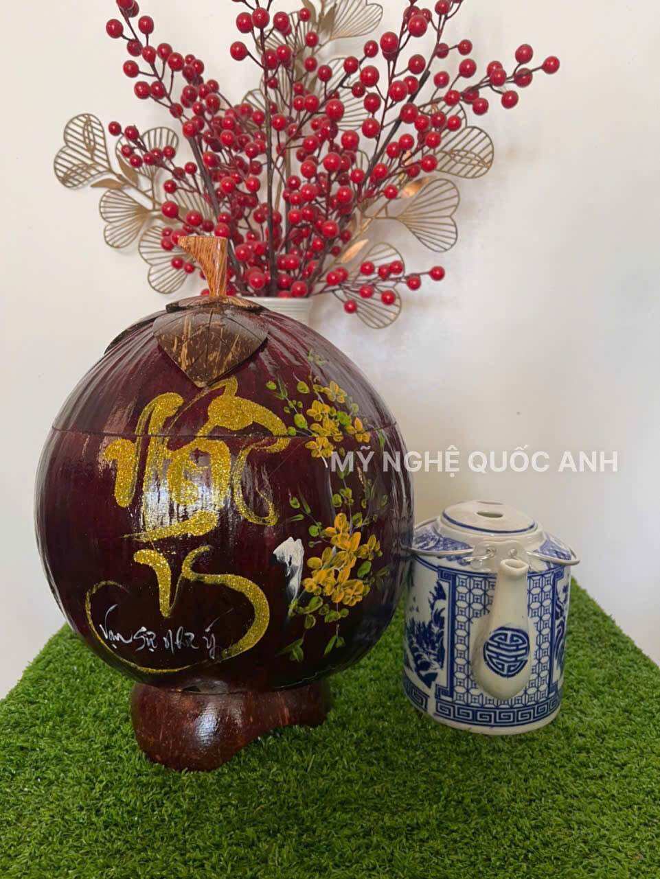 Vỏ dừa ủ ấm trà giử nhiệt vẽ thư pháp