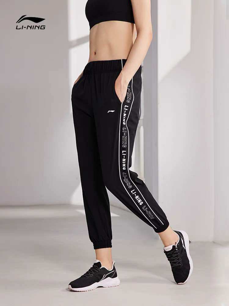 Quần gió nữ Lining AYKR136