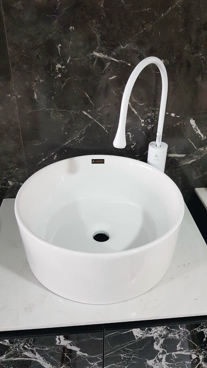 Chậu Lavabo đặt bàn trắng tròn, dáng nghệ thuật( giá chưa kèm vòi)
