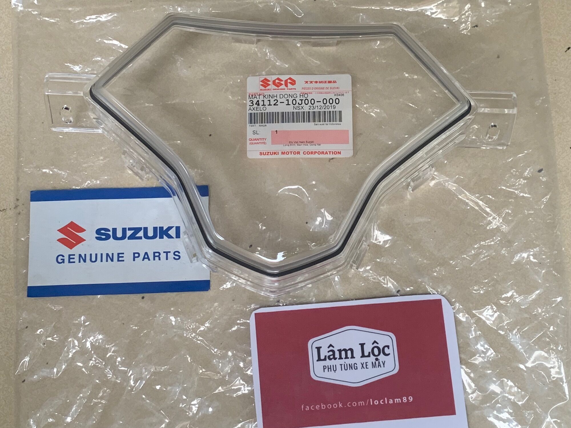 Mica mặt kính đồng hồ axelo 125 suzuki chính hãng