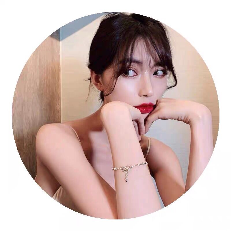 Vòng tay chuỗi ngọc đính nơ tiểu thư