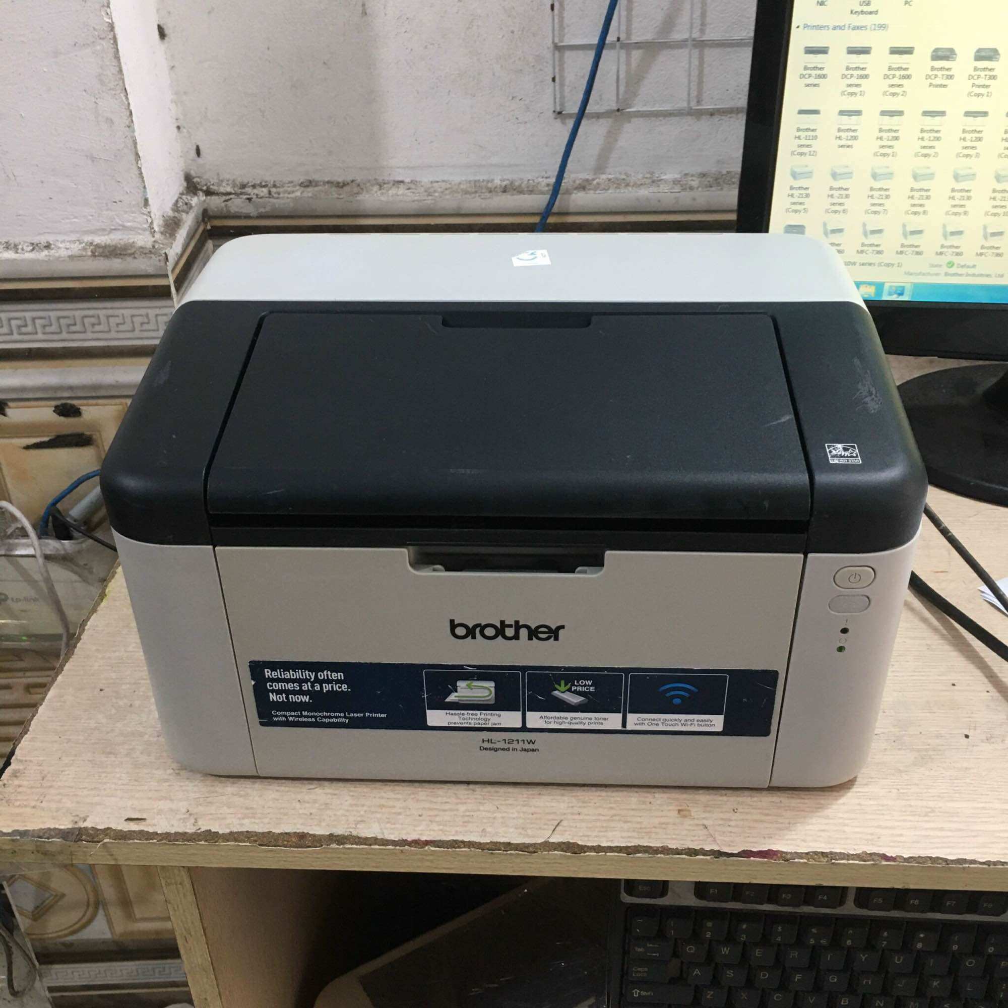 Máy in văn phòng ( in 1 mặt a4,a5 qua wifi nhỏ gọn ) - brother 1211w ( tặng hộp mực không mực thải - dây nguồn , cáp in mới 100% đi theo máy )