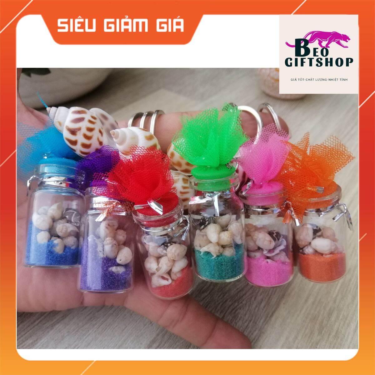 Móc khóa chai thủy tinh đựng ốc size 2*4 cm