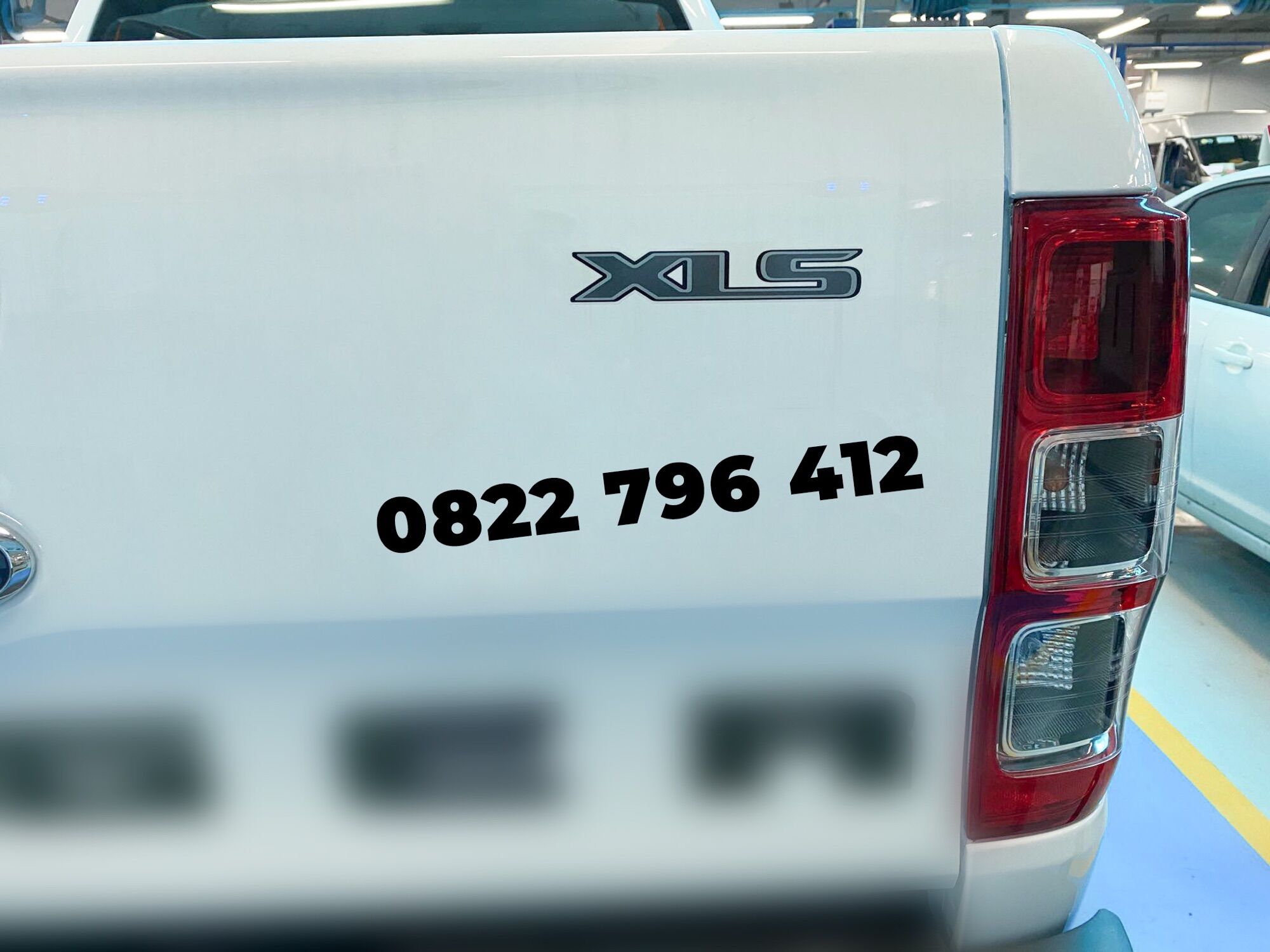 Tem chữ XLS sau xe ranger. Tem XLS