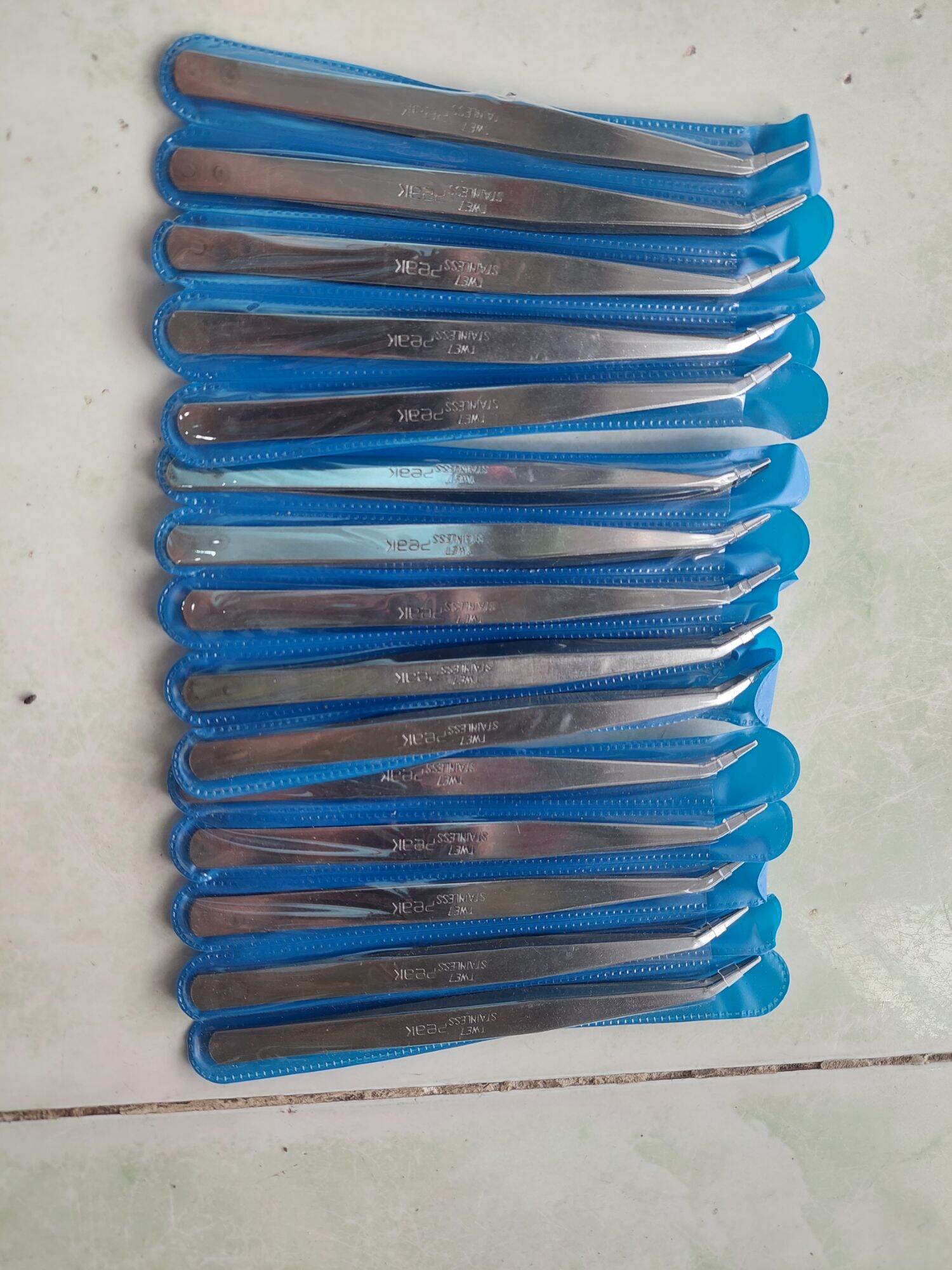 nhíp cong gắp chỉ cao cấp