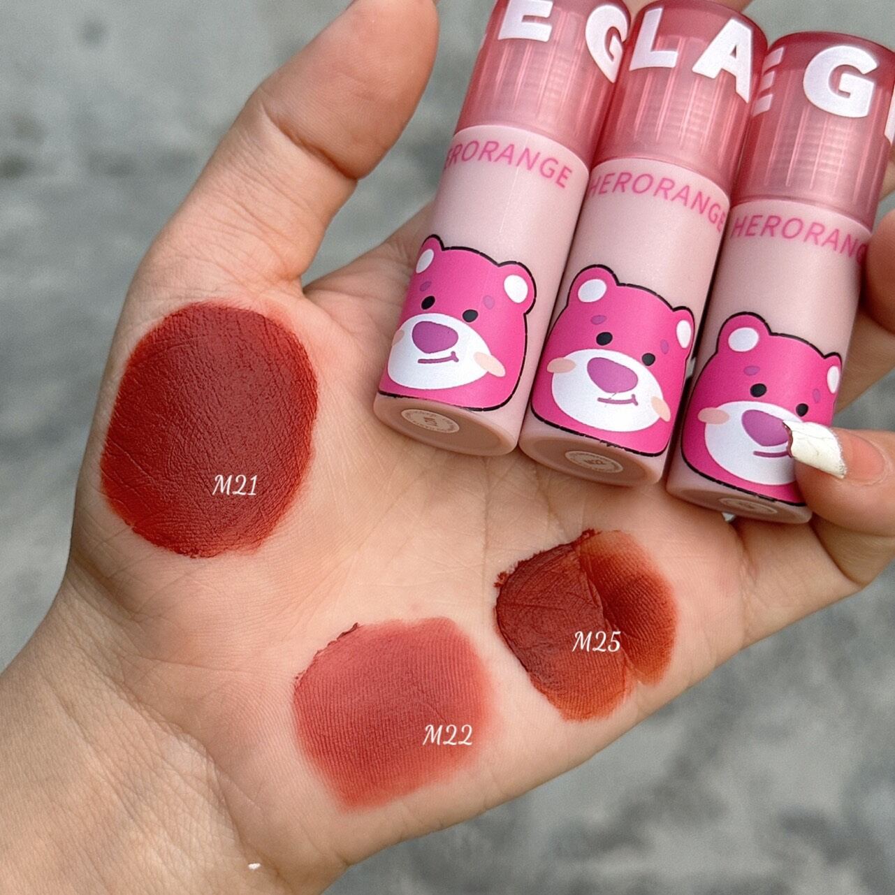 Son kem gấu dâu herorange màu m21 dupe a12 chất son kem mịn,mềm môi dễ tán, lên màu chuẩn
