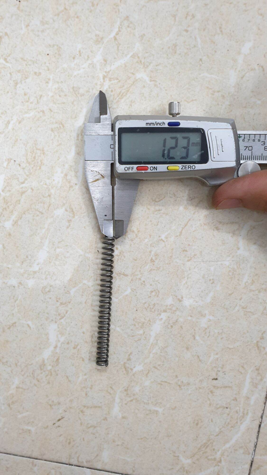 Lò xo phi 7 sợi 1.2 dài 7cm