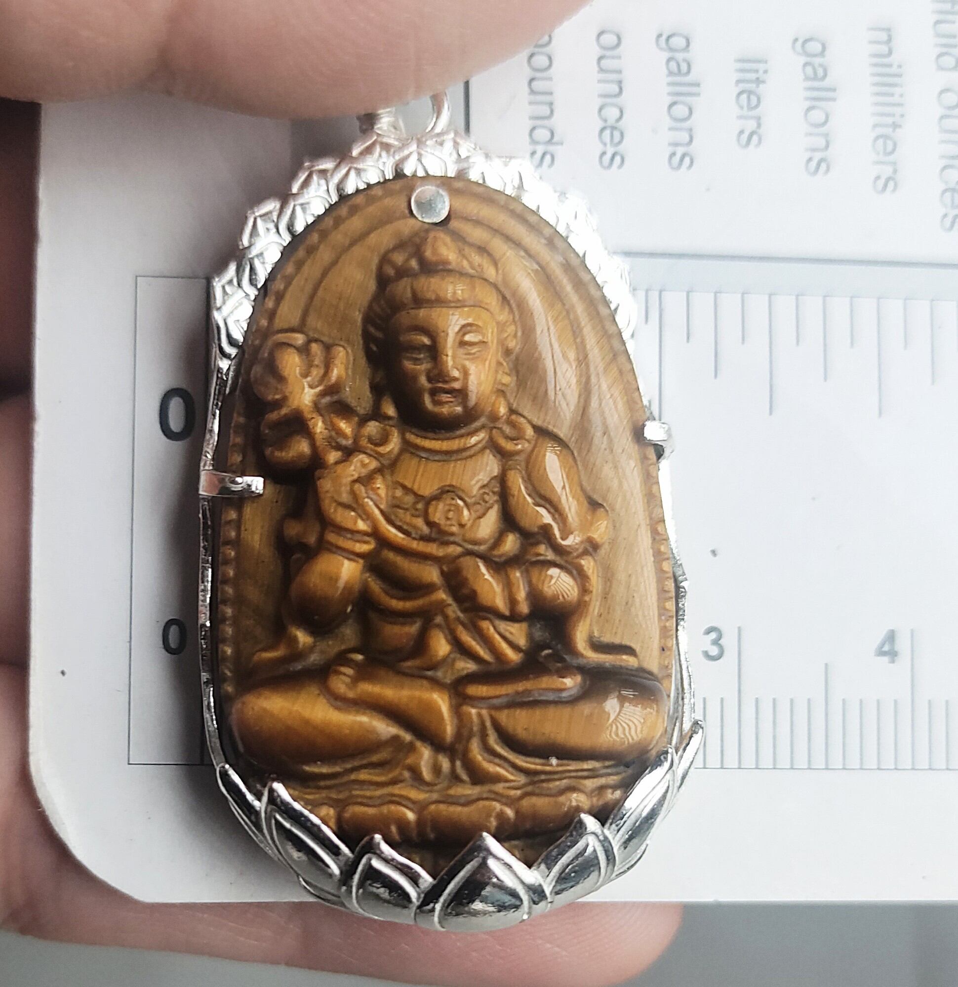 Mặt dây chuyền phật bản mệnh mắt hổ bọc bạc