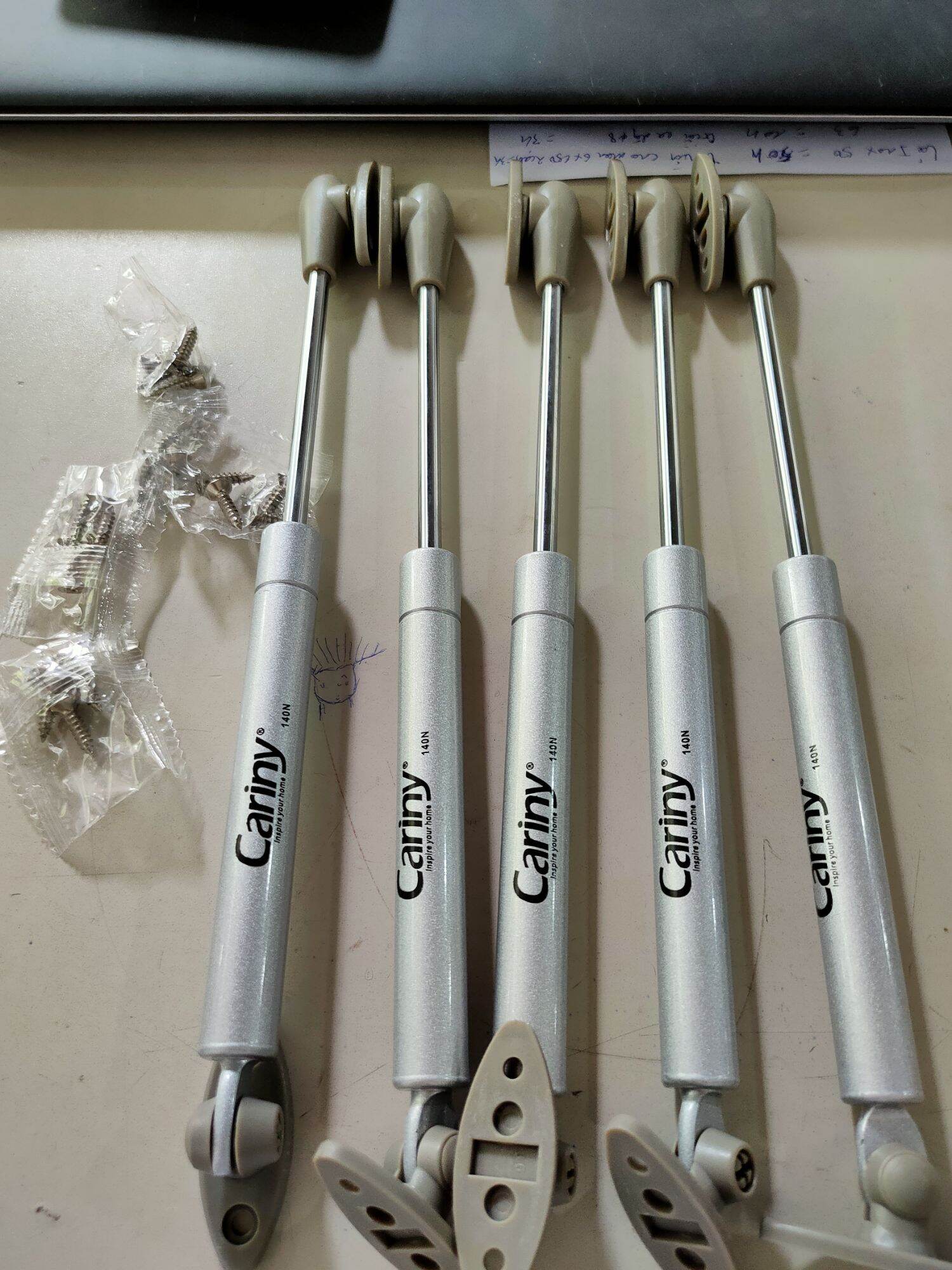 Pittong cariny tay nâng đẩy cánh tủ-tay thủy lực-tay nâng hạ cánh tủ