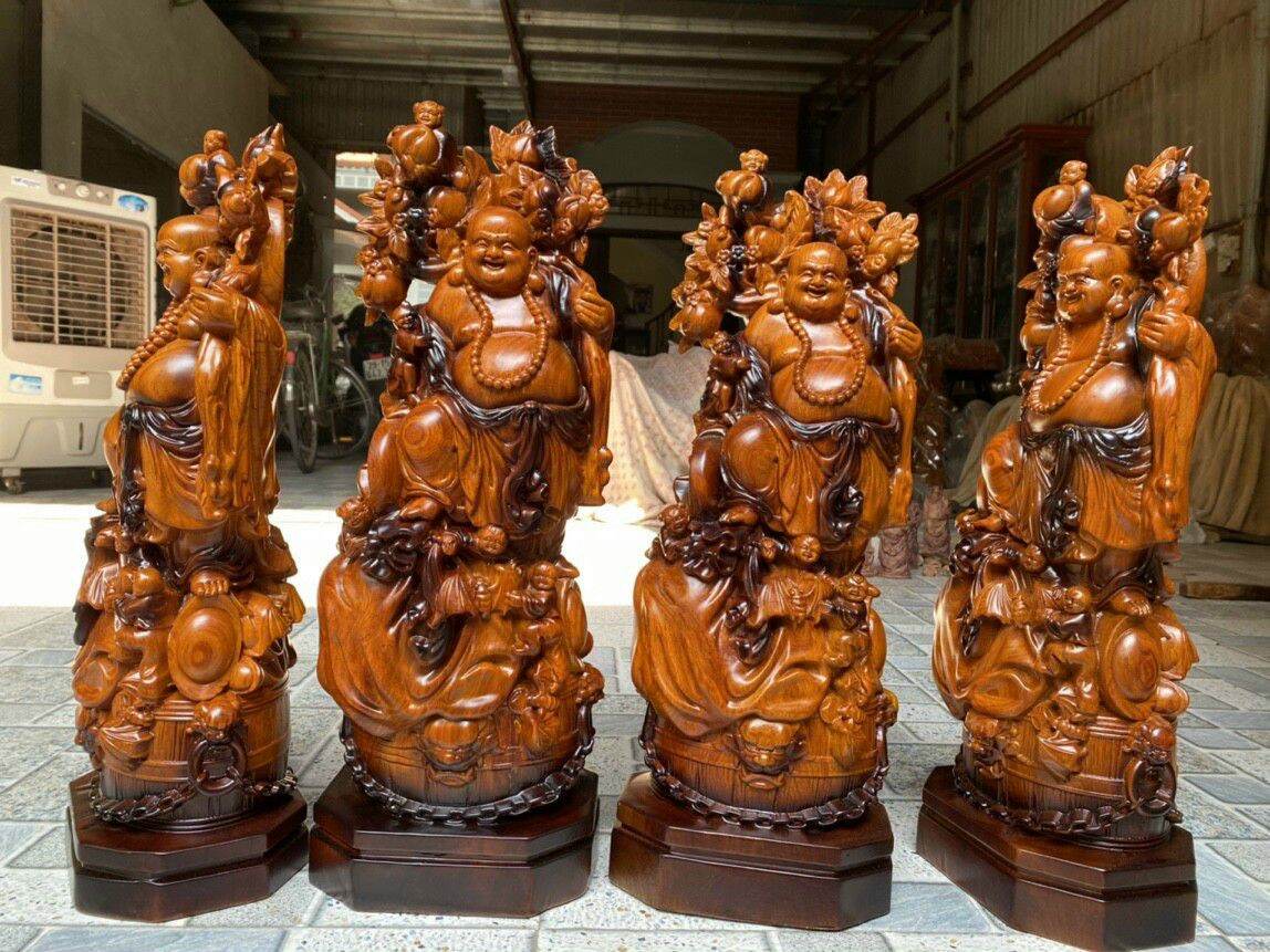 Tượng Phật di lặc vác cành đào bằng gỗ hương tô mầu giả cổ  cao 40 50 60
