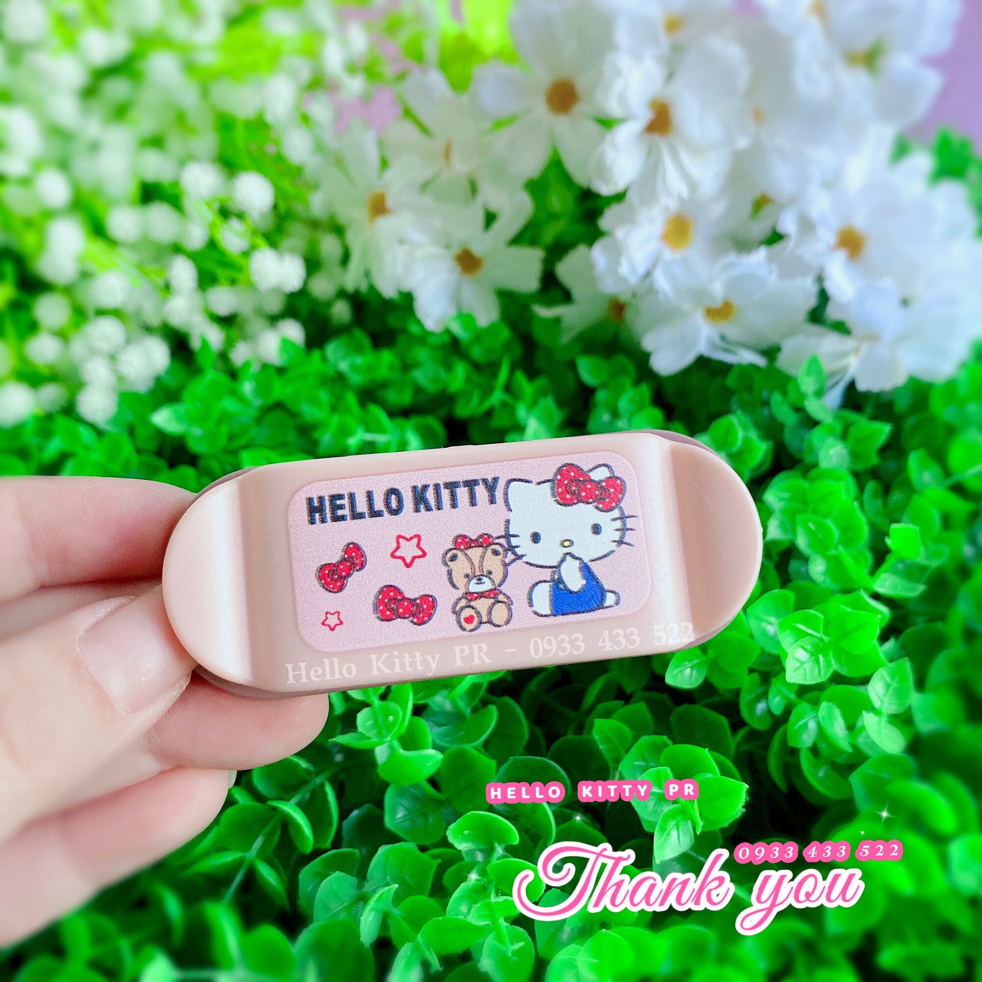 Kẹp giữ phích cắm Hello Kitty - Doremon Doraemon