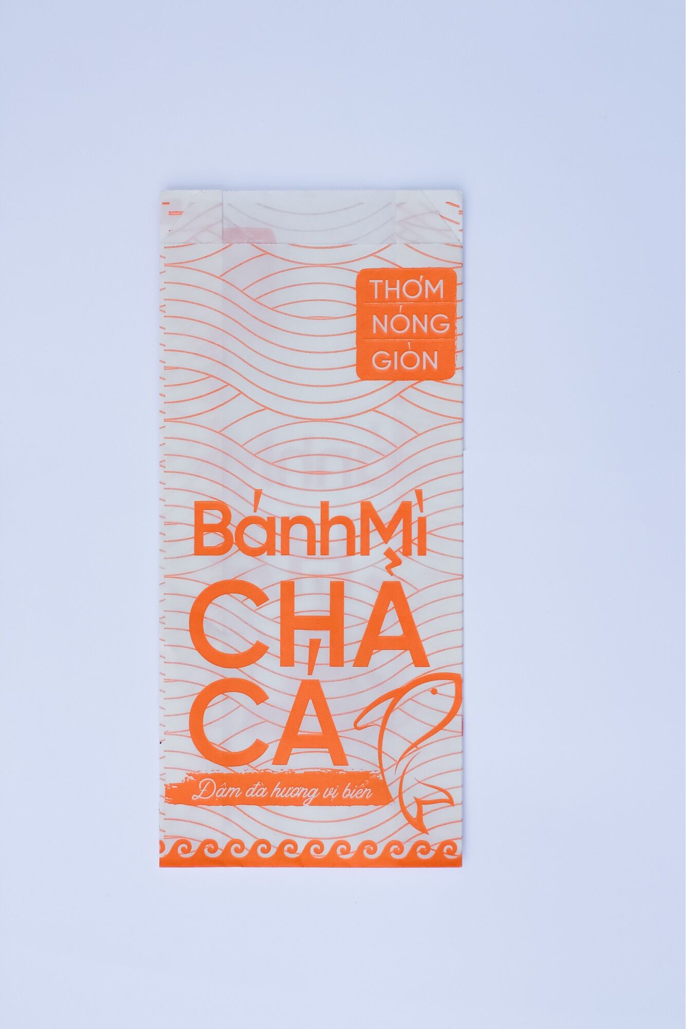 Túi Giấy Đựng Bánh Mì Chả Cá Cam 500 Túi