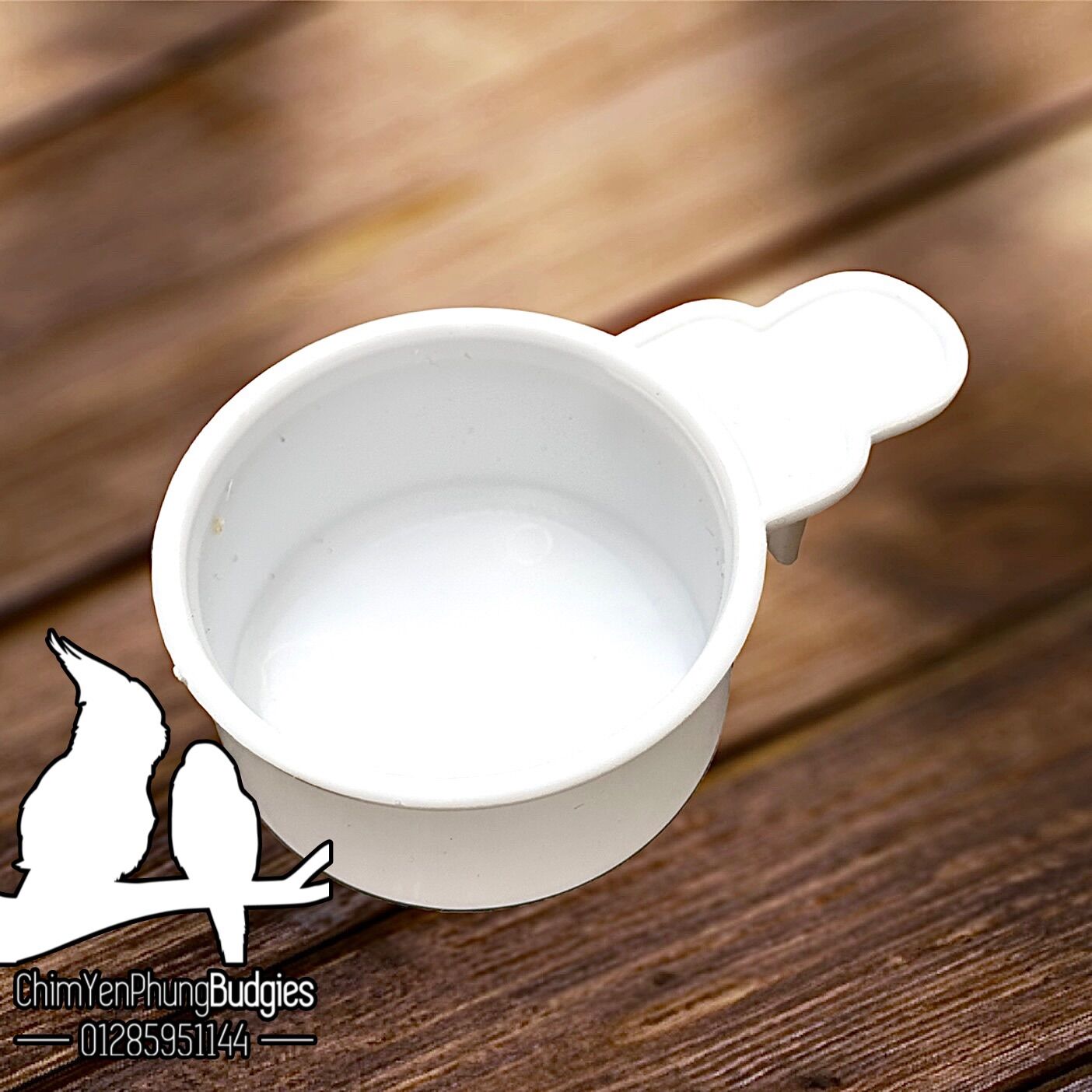Cóng nhựa trắng nhỏ đựng khoáng, vitamin... cho Chim Cảnh.