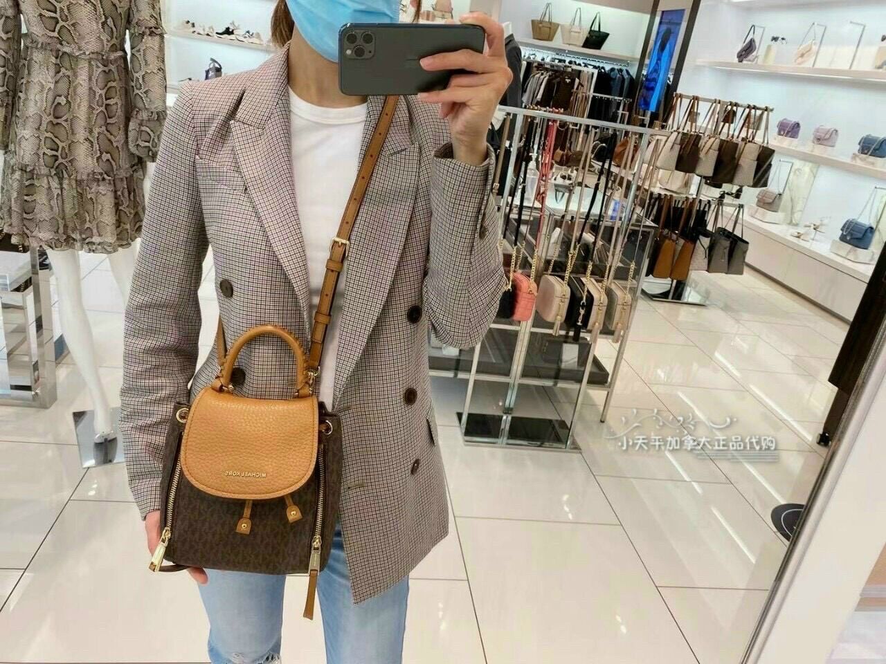 Balo MK mini dây rút 2 ngăn kéo phía trước