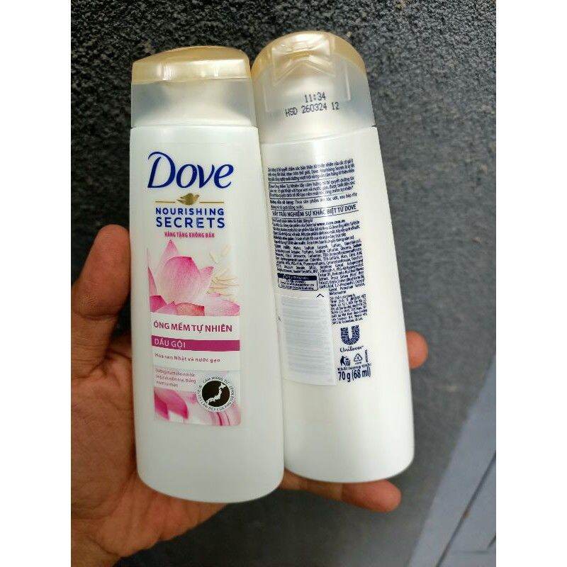 Dầu gội dove óng mềm tự nhiên từ hoa sen nhật và nước gạo 70g