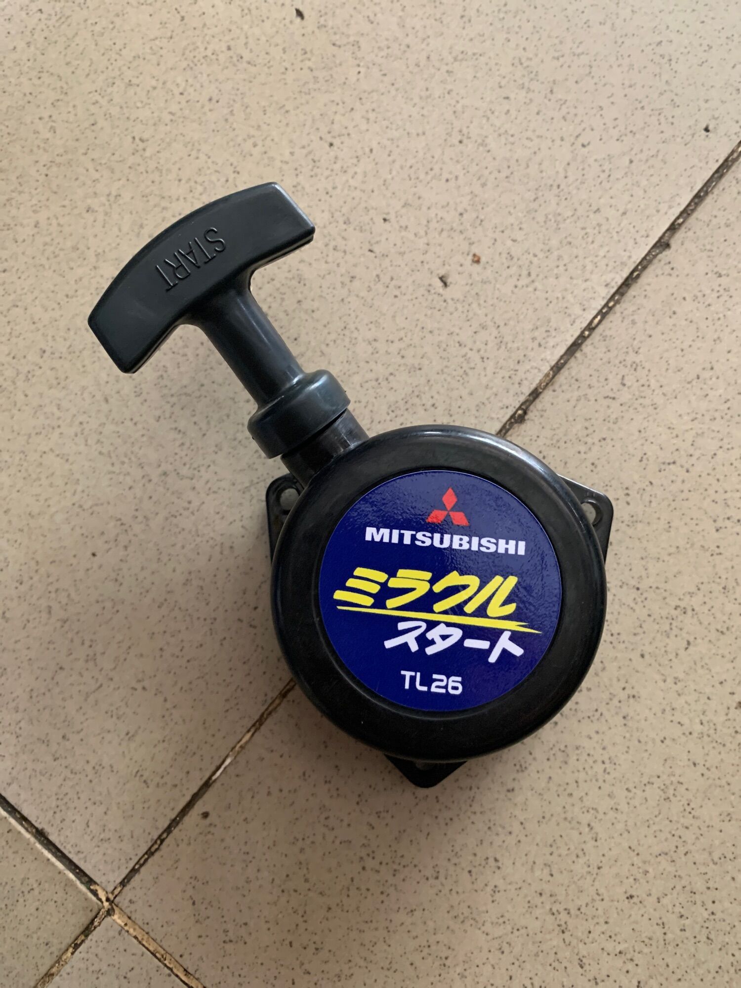 Chụp giật máy cắt cỏ Mitsubishi TL26