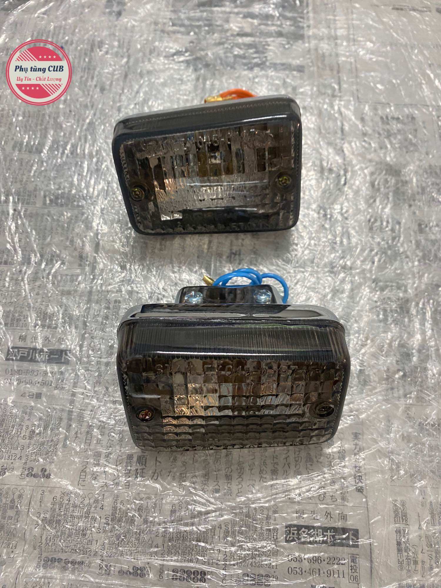 Xi nhan xe cub 82-84-DD màu khói