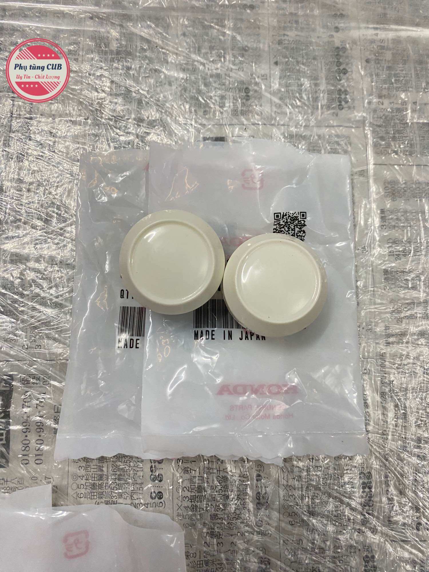Nút chụp phuộc trước xe cub hàng zin mới ( giá 1 cặp )