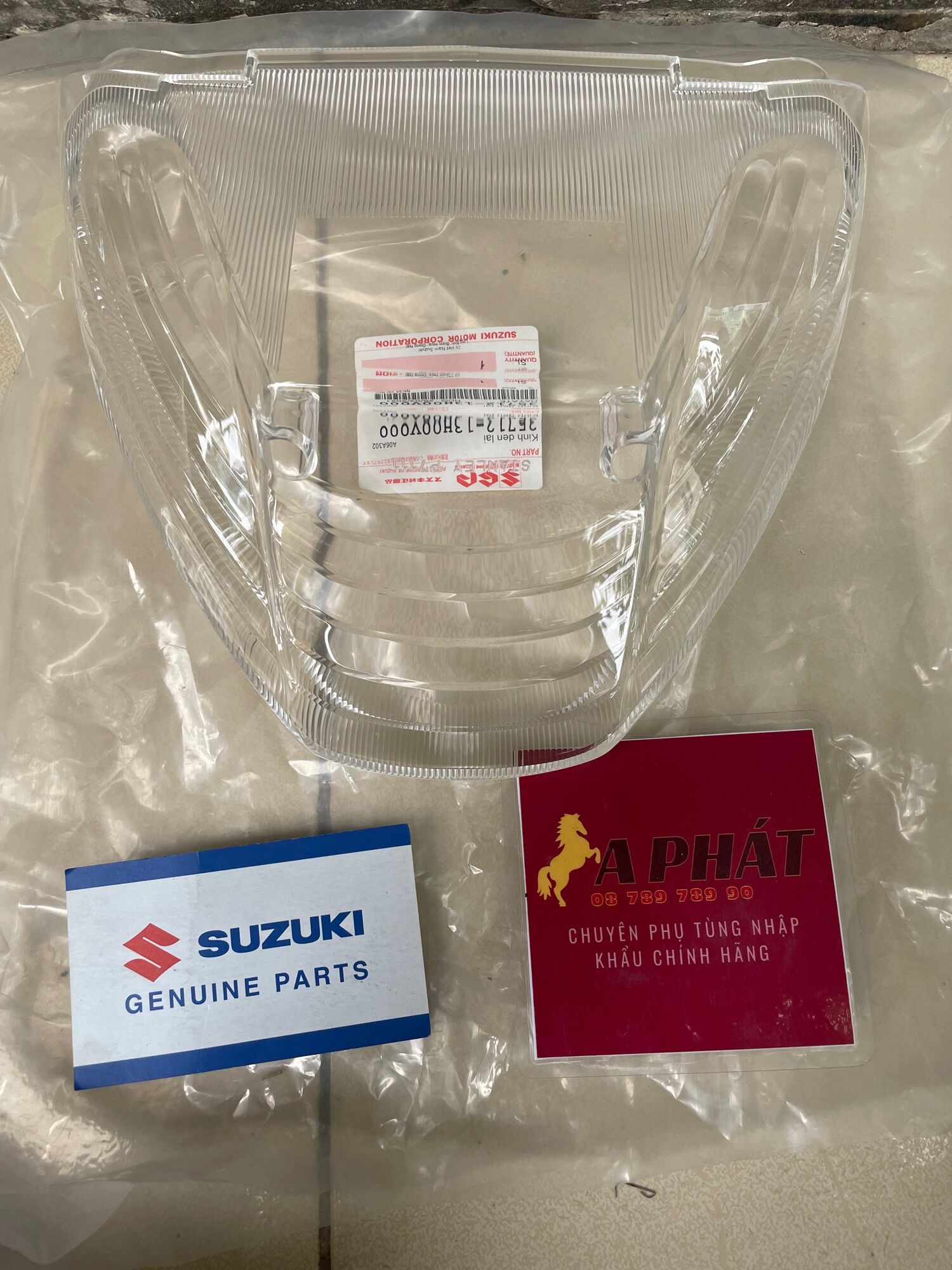 Kính đèn lái suzuki hayate